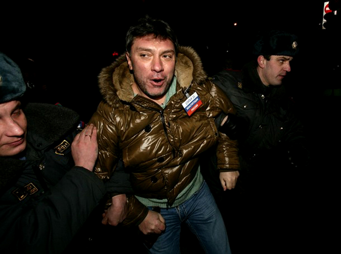 MOSCOW - JANUARY 31:  Police officers detain former First Deputy Prime Minister Boris Nemtsov, leader of the opposition group Solidarity, during an unauthorized anti-Kremlin protest January 31, 2010 in downtown Moscow, Russia. Several hundred demonstrators gathered today in a central Moscow square, defying a ban imposed by authorities. The protesters said their rally was banned in violation of the Russian constitution's guarantee of the right to gather. Police quickly broke up the protest and detained several dozen demonstrators.  (Photo by Konstantin Zavrazhin/Getty Images)